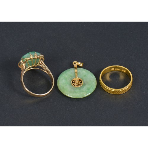 206 - A Chinese Gold Wedding Band with Zig Zag Decoration. Weighing: 3.7 grams. Along with a Jade Ring & a... 