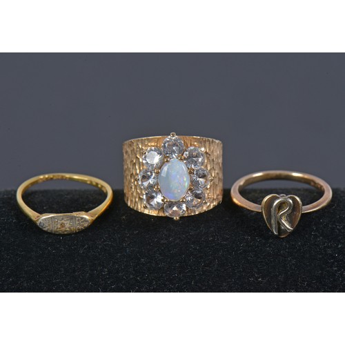 207 - A Heavy 9ct Gold 1970s Dress Ring mounted with Spinels & two Gold Dress Rings. Weighing: 9.9 grams. ... 