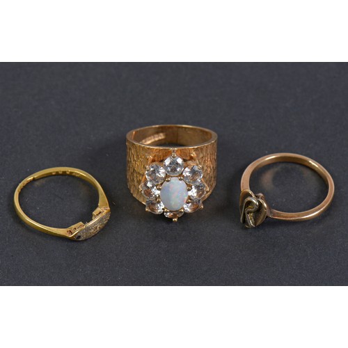 207 - A Heavy 9ct Gold 1970s Dress Ring mounted with Spinels & two Gold Dress Rings. Weighing: 9.9 grams. ... 