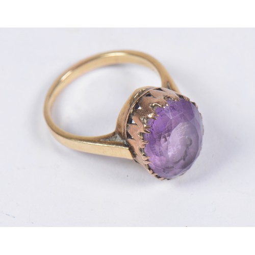 223 - A Ladies 14ct Gold Amethyst mounted Dress Ring. Size: P. Weighing: 5 .4 grams. (Gross).