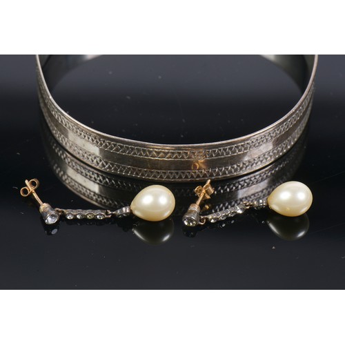 224 - A Pair of Long Drop 'Pearl' Earrings & a Silver Bangle.