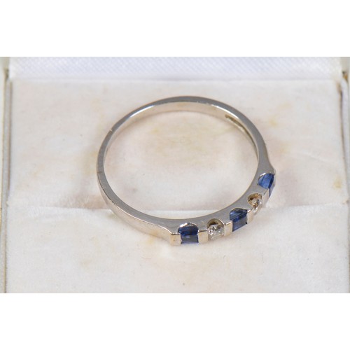 229 - A (750 marked) White Gold Dress Ring mounted with Sapphires & Diamonds. Size: Q. Weighing: 2.2 grams... 