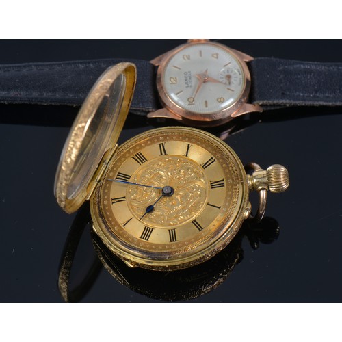 293 - A Ladies Floral chased & engraved 18k Gold Swiss Fob Watch & a 