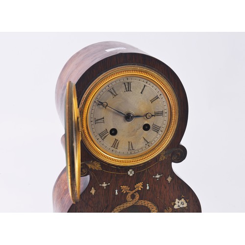 345 - A French Rosewood Cased Barrel shaped Bracket Clock on a shaped base with brass dolphin inlay, Vase ... 