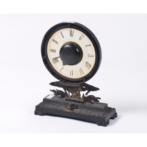 348 - A French Metal Desk Clock with a Glass Face & an Eagle Surmount.