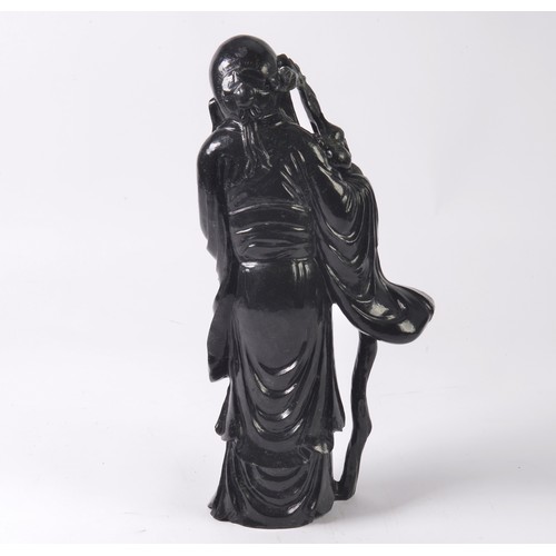 374 - A 20th Century Chinese Hardstone Figure (Possibly Jade) of a Chinese Immortal. Standing 37cms Tall. ... 