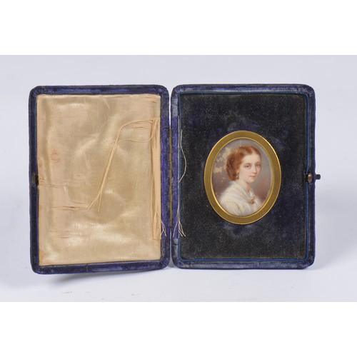 464 - A Miniature of a Young Girl in a lace frilled dress contained in a Blue Velvet Case.