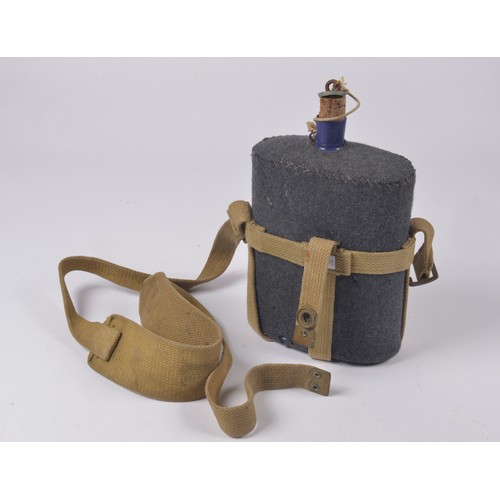 496 - A WWII period Water Flask with a Woven Strap.