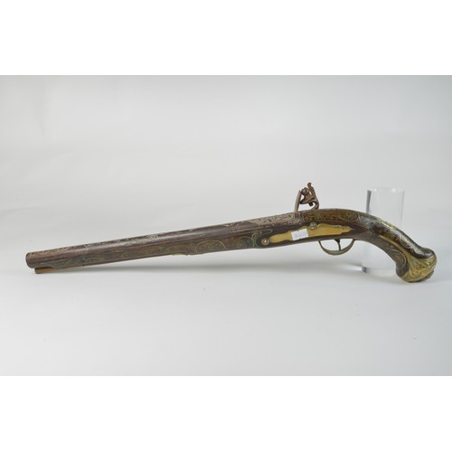 505 - An Antique Ottoman Turkish Empire Flintlock Action Pistol with Brass inlaid Stock engraved floral Gu... 