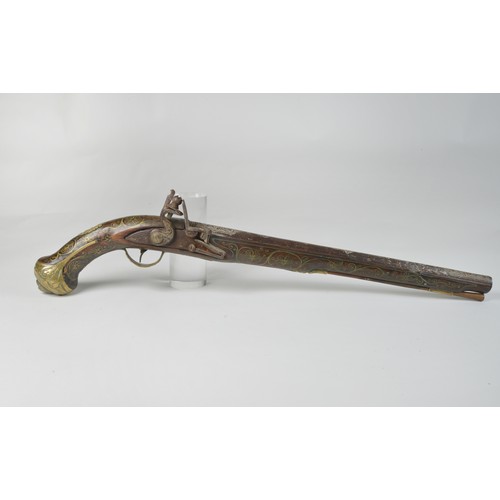 505 - An Antique Ottoman Turkish Empire Flintlock Action Pistol with Brass inlaid Stock engraved floral Gu... 