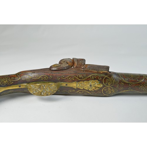 505 - An Antique Ottoman Turkish Empire Flintlock Action Pistol with Brass inlaid Stock engraved floral Gu... 