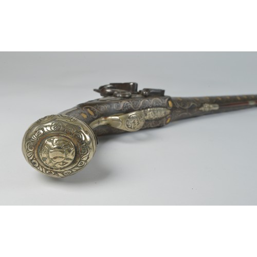 506 - A French Ottoman Empire Flintlock Pistol with Floral engraved Barrel, Silver inlay with gilt bosses,... 