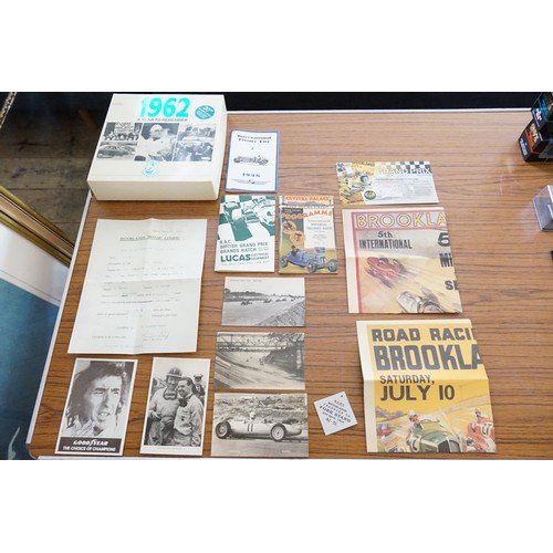 532 - A Signed Jackie Stewart Photo, a 1929 Brooklands Motor Course Entry Form, Racing Post Cards, Posters... 