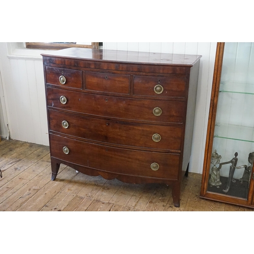 556 - A Georgian Mahogany Bow Fronted Chest of Three Short & Three Long Drawers resting on Bracket & Brass... 