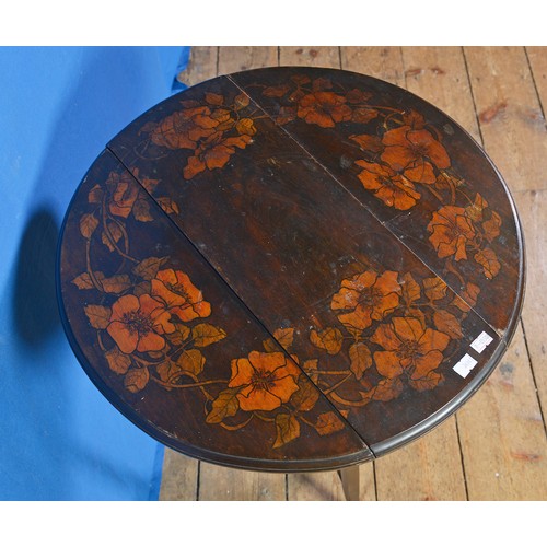 566 - An Art Nouveau Folding Circular Poker Work decorated Coaching Table resting on Swept out Legs. Measu... 