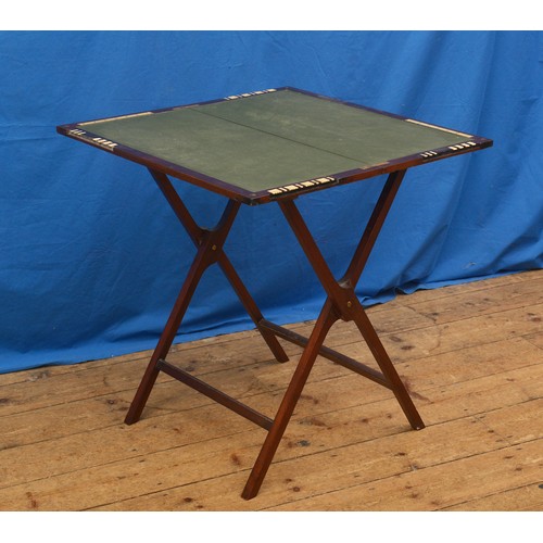 573 - A Victorian Mahogany Folding Bridge Table with inset Flip-Up Numerals & resting on an X Framed Base.... 