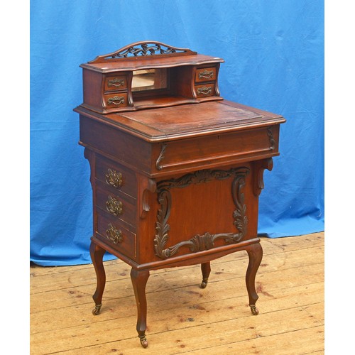 582 - A Victorian Davenport design Ladies Writing Desk with a sliding top fitted on a Base with three draw... 