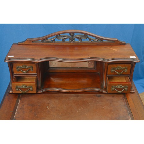 582 - A Victorian Davenport design Ladies Writing Desk with a sliding top fitted on a Base with three draw... 