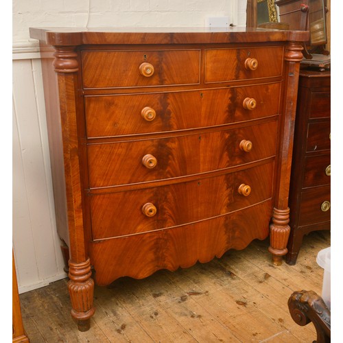 584 - A North Country Cuban Flame Veneered Bow Fronted & Pillared Chest of Drawers. Measuring: 130cms acro... 