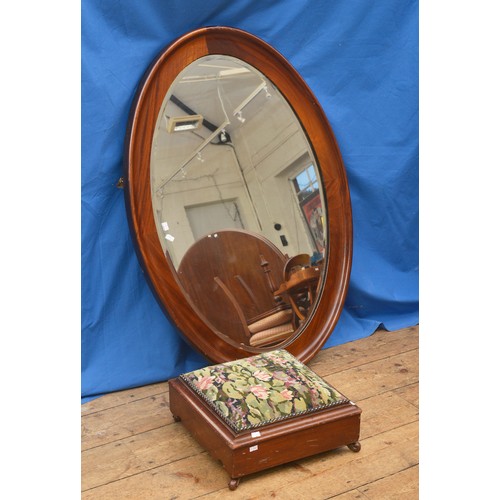 586 - A Mahogany Floor Poof with a Tapestry Seat and a Large Oval Entrance Hall Mirror in Mahogany.