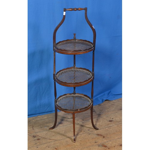 595 - A Victorian Three Tier Cake Stand with Bergere fitting. measuring: 88cms high.