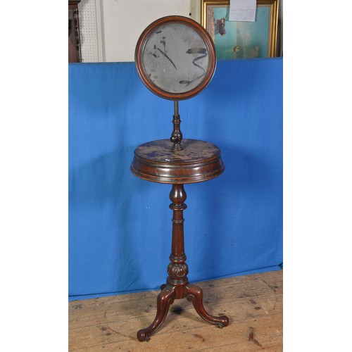 596 - A Victorian Mahogany Shaving Mirror on a Circular Twin Compartment Revolving Top resting on a shaped... 