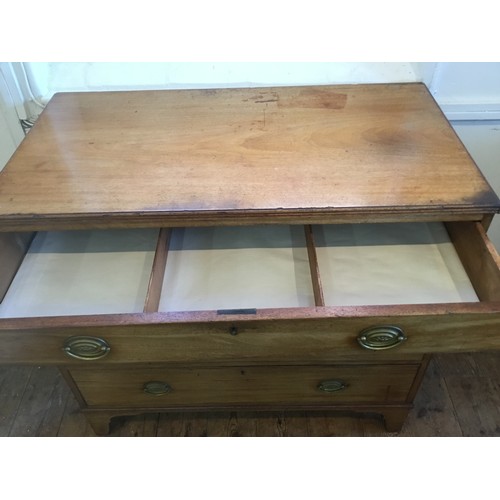 603 - A Victorian Mahogany Straight Front Chest of Four Graduated Drawers resting on Bracket Feet & Brass ... 