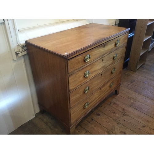 603 - A Victorian Mahogany Straight Front Chest of Four Graduated Drawers resting on Bracket Feet & Brass ... 