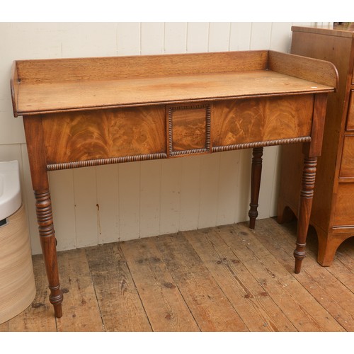 605 - A Scottish Tray Back Cuban Mahogany Veneered Fronted Two Drawers Wash Stand resting on turned legs. ... 