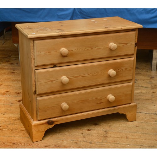 608 - A Pine Three Drawers Chest with Bun Handles & resting on Bracket Feet. Measuring: 81cms across x 34c... 