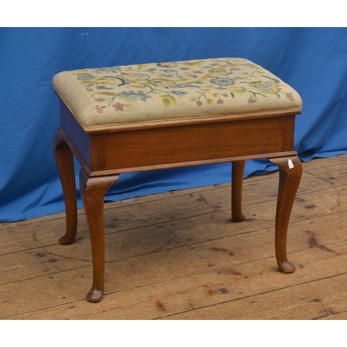 610 - A Mahogany Tapestry Topped Piano Stool resting on pad feet.