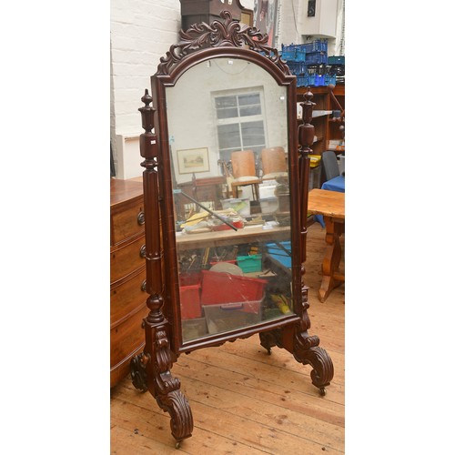 611 - A Victorian Revival Swing Frames Cheval Mirror with Urn Finials, turned sides & resting on a heavy c... 