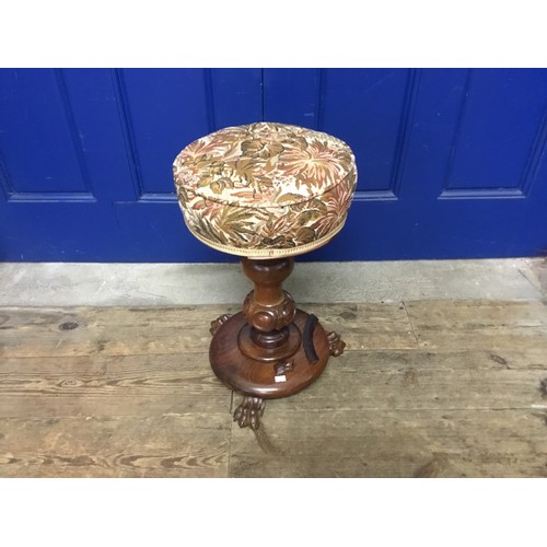 624 - A Victorian Mahogany Piano Stool resting on singular turned Column, Claw & Ball Feet.