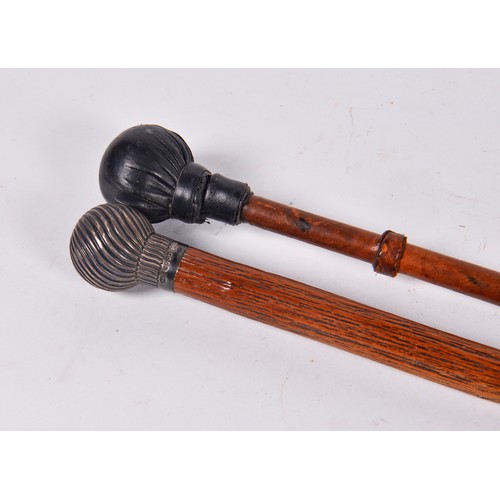 640 - A Silver mounted Walking Stick by Brigg & an African Riding Crop.