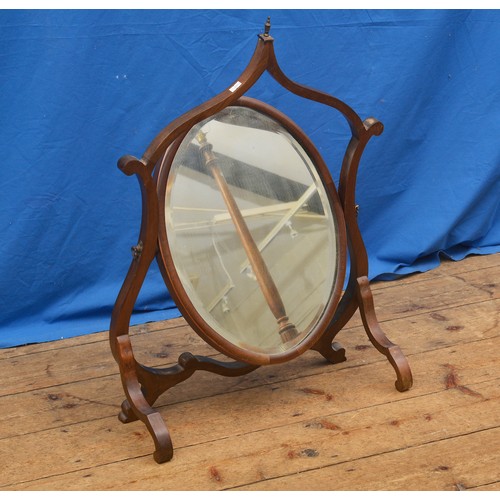 658 - An Edwardian Swing Framed Dressing Table Mirror contained in a Shield Shaped Frame.