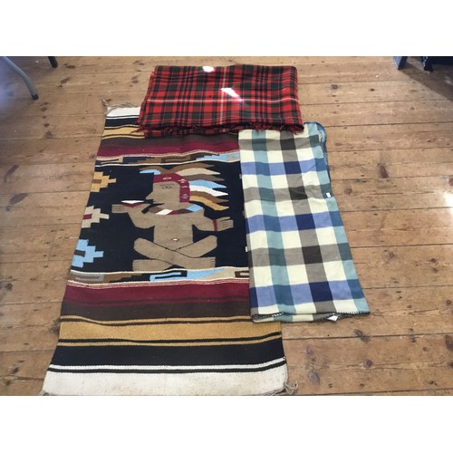 688 - An Aztec Door Hanging decorated with a Warrior, a Tartan Car Blanket & a square decorated Blanket.