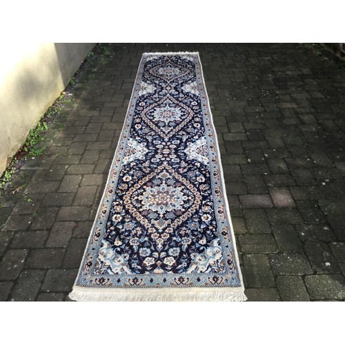 696 - An Asian Blue Ground, Three Eye, Eight Quattro foil, Beige & Green Trellis Runner. Measuring: 380cms... 