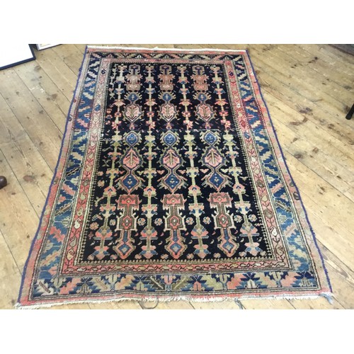 701 - A Kurdish Sauj Bulagh Antique Rug. Measuring: 195cms x 125cms.