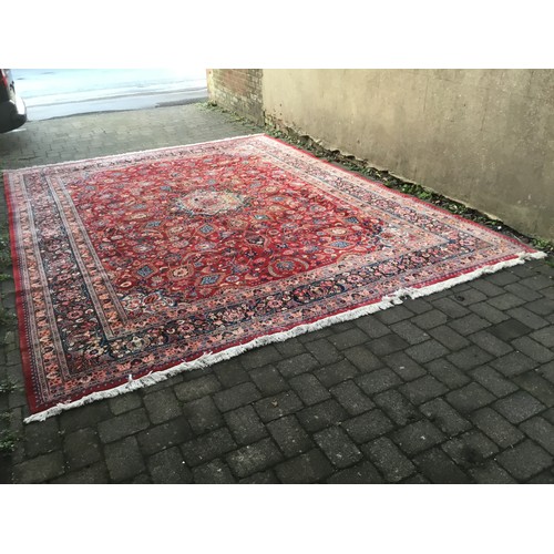 705 - A Very Large Genuine Persian/Iranian Woollen Rug in a typical Herati pattern or Garden design. Measu... 