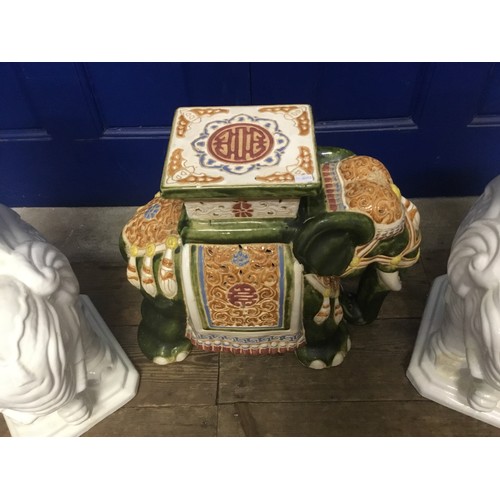 712 - A Multi Coloured Glazed Pottery Elephant Conservatory Seat along with two White Versions.