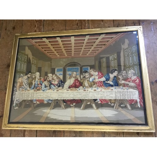 714 - A Tapestry Panel of the Last Supper in Frame. (AF). Measuring: 87cms x 64cms.