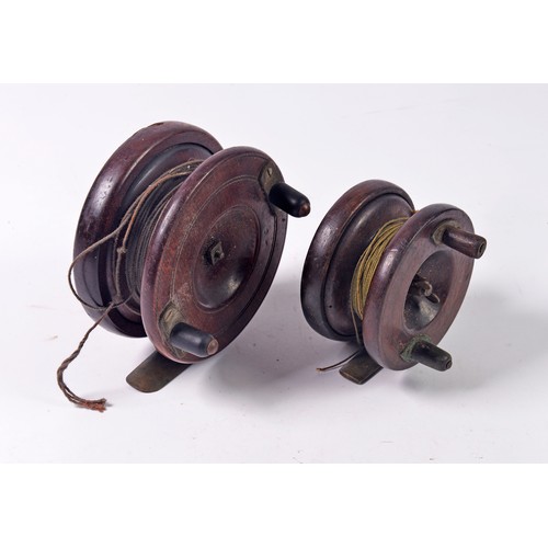 723 - Two Nottingham Style Centre Pin Wooden Fishing Reels with Brass mounts.