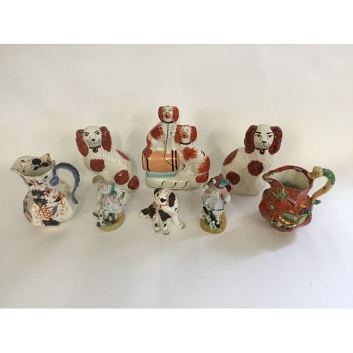 729 - Three Staffordshire Flat Back Spaniel Ornaments, a German Spaniel, Two Jugs, etc.