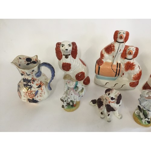 729 - Three Staffordshire Flat Back Spaniel Ornaments, a German Spaniel, Two Jugs, etc.