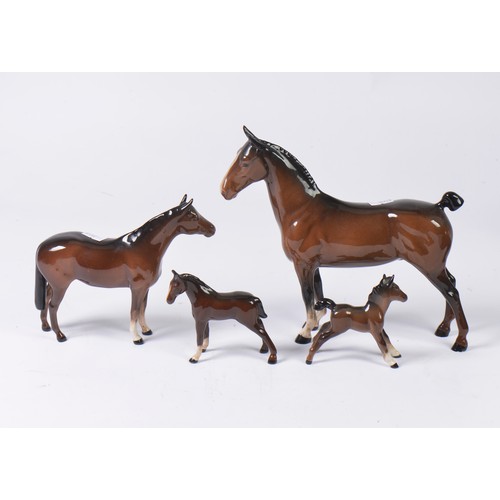 760 - Four Brown & Black Glazed Beswick Horses consisting of a Stallion, a Mare & Two Foals all with White... 