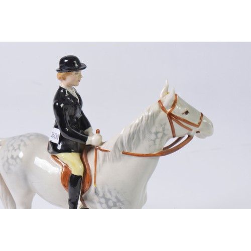 762 - A Beswick Study of a Young Girl show Jumper on Horse with Yellow Trousers, Black Jacket, Crop on a G... 