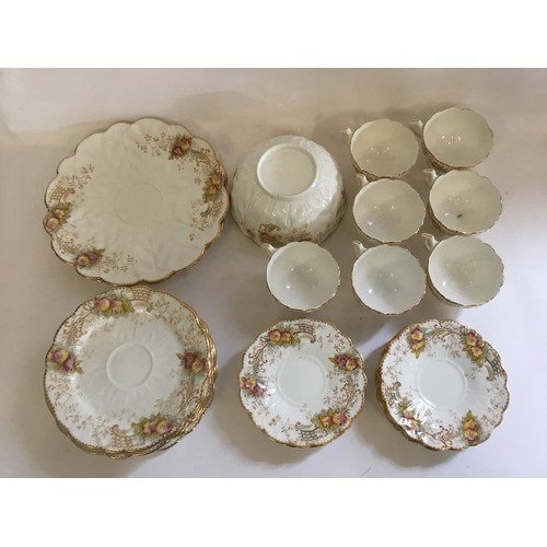 767 - An Edwardian Trellis & Summer Flower Gilt edged & Shaped Bordered Tea Set consisting of Cups, Saucer... 