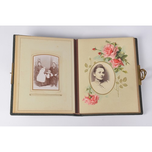 817 - A Victorian Photograph Album containing a Collection of Photographs with Chromolithographic interior... 