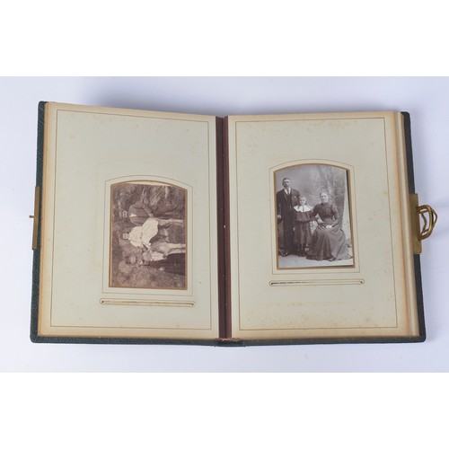 817 - A Victorian Photograph Album containing a Collection of Photographs with Chromolithographic interior... 