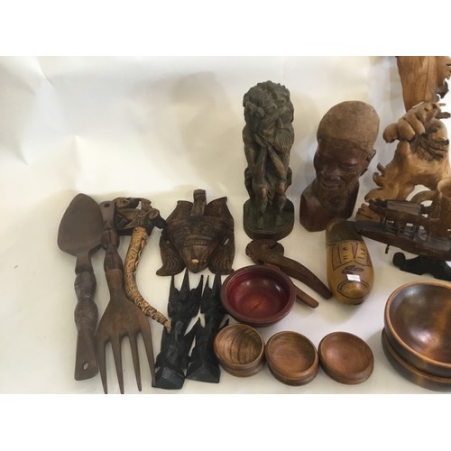 822 - A Large Collection of Treen to include American turned Bowls, Nut Crackers, African Wood Carvings, D... 